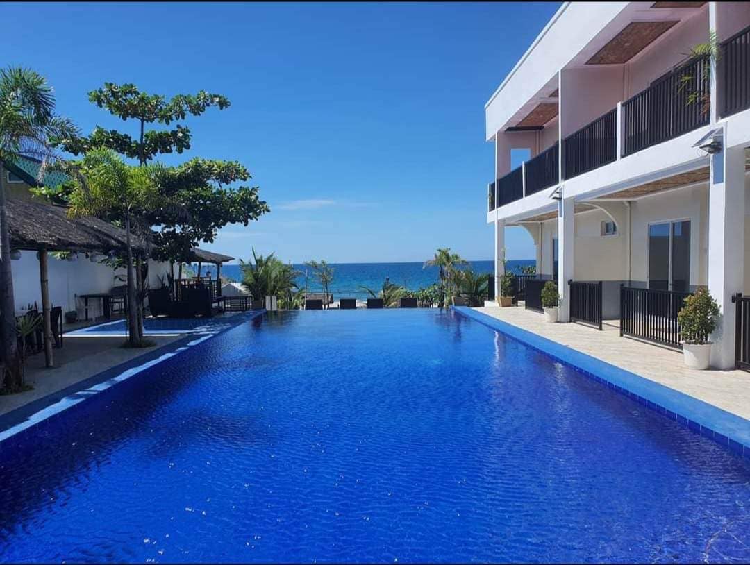 The Beach House at Cabangan - Beachfront infinity pool with ocean view